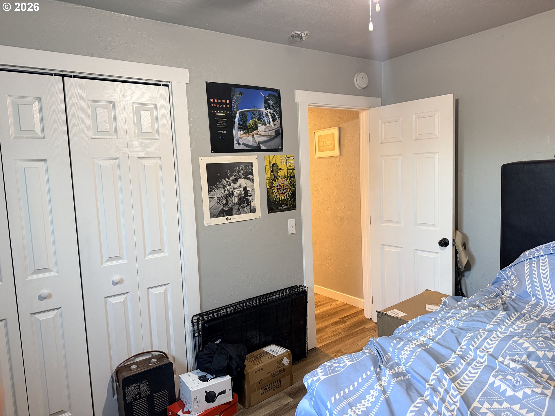 677 Southeast Moffitt Road Waldport, OR 97394 - Photo 31 of 36 a bedroom with a bed and a window