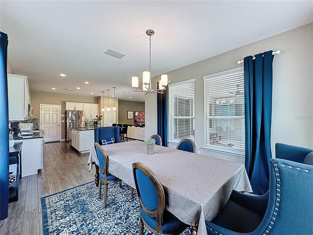 201 Silver Maple Road Groveland, FL 34736 - Photo 19 of 89 a view of a dining room and livingroom