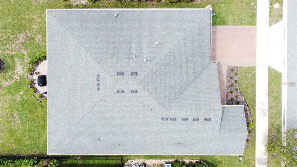 201 Silver Maple Road Groveland, FL 34736 - Photo 59 of 89 an aerial view of a house with a yard