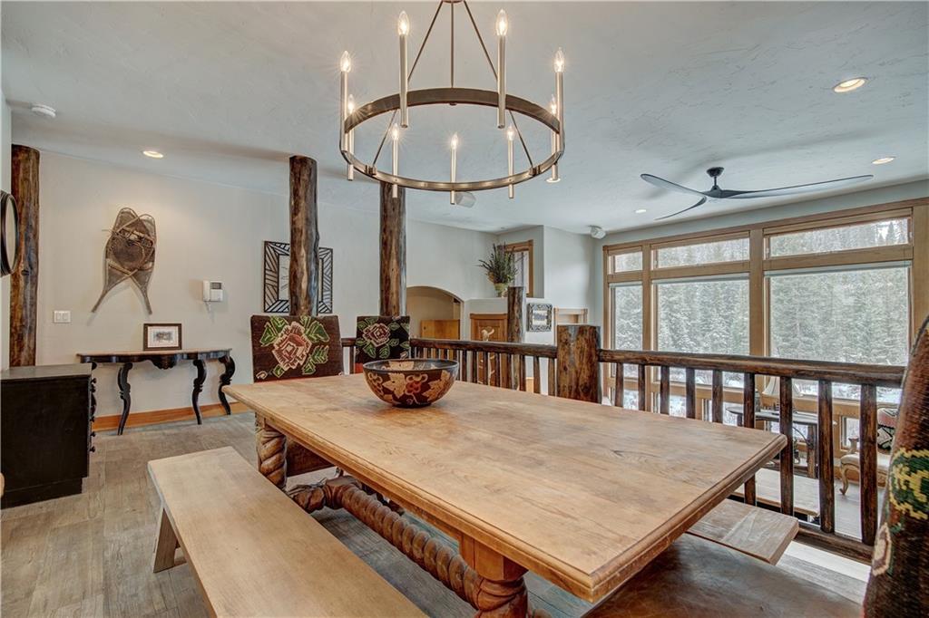 72 River Run Road Keystone, CO 80435 - Photo 11 of 35 a view of a dining room with furniture window and outside view