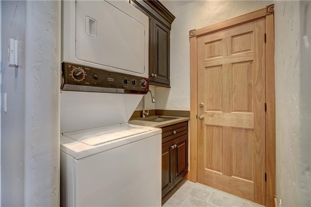 72 River Run Road Keystone, CO 80435 - Photo 30 of 35 a utility room with dryer and washer