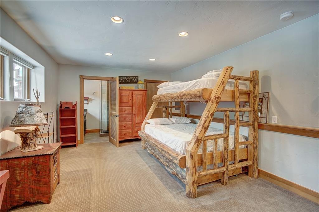 72 River Run Road Keystone, CO 80435 - Photo 32 of 35 a bedroom with bed and window