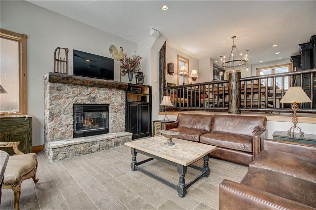 72 River Run Road Keystone, CO 80435 - Photo 7 of 35 a living room with furniture fireplace and flat screen tv