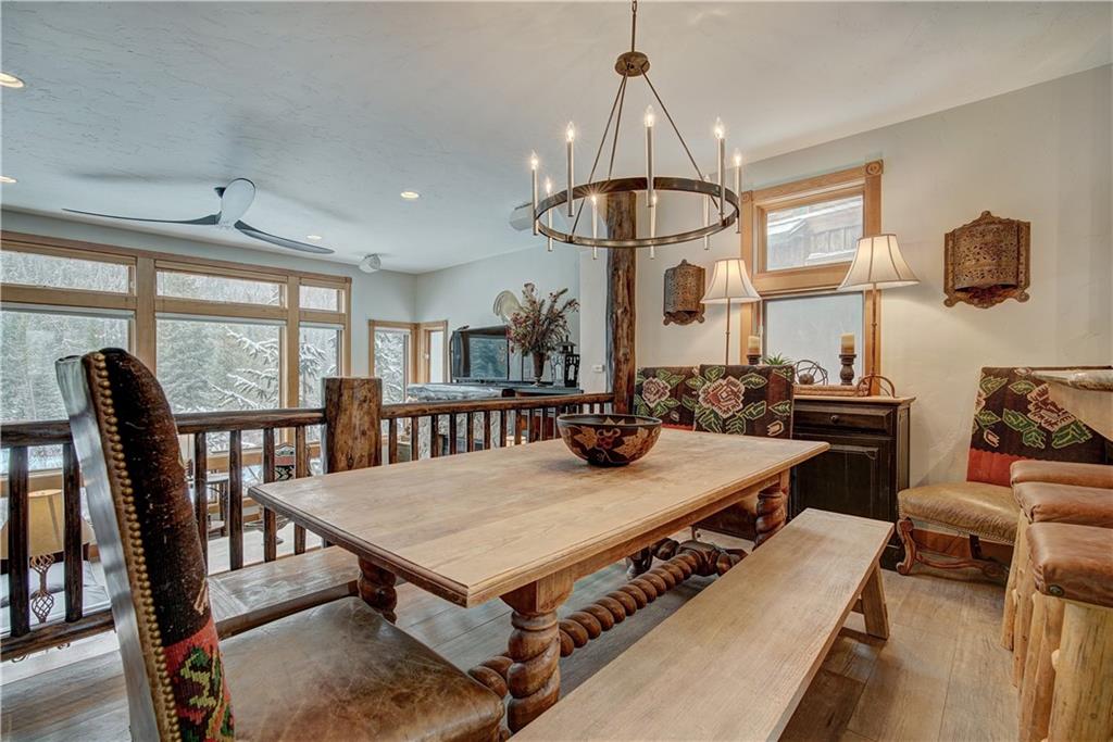 72 River Run Road Keystone, CO 80435 - Photo 10 of 35 a view of a dining room with furniture window and outside view