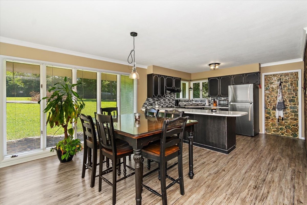 19 Horseshoe Bend Road Leoma, TN 38468 - Photo 5 of 29 a kitchen with a table and chairs in it