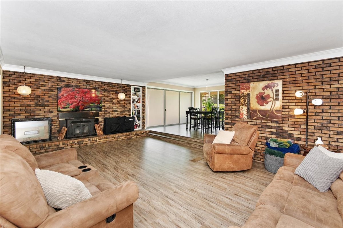 19 Horseshoe Bend Road Leoma, TN 38468 - Photo 10 of 29 a living room with fireplace furniture and a flat screen tv