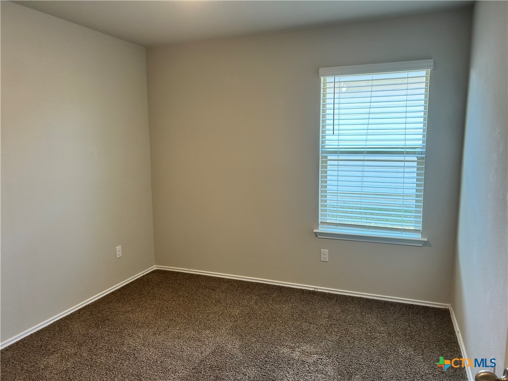 8419 Brahma Plns Road Temple, TX 76502 - Photo 14 of 17 an empty room with a window