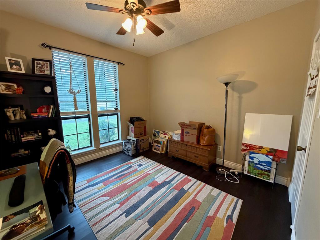 925 Manciples Way Abilene, TX 79602 - Photo 11 of 30 a bedroom with a bed closet and a window