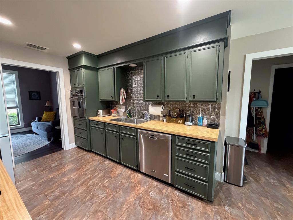 925 Manciples Way Abilene, TX 79602 - Photo 18 of 30 a spacious bathroom with a sink double vanity and a mirror