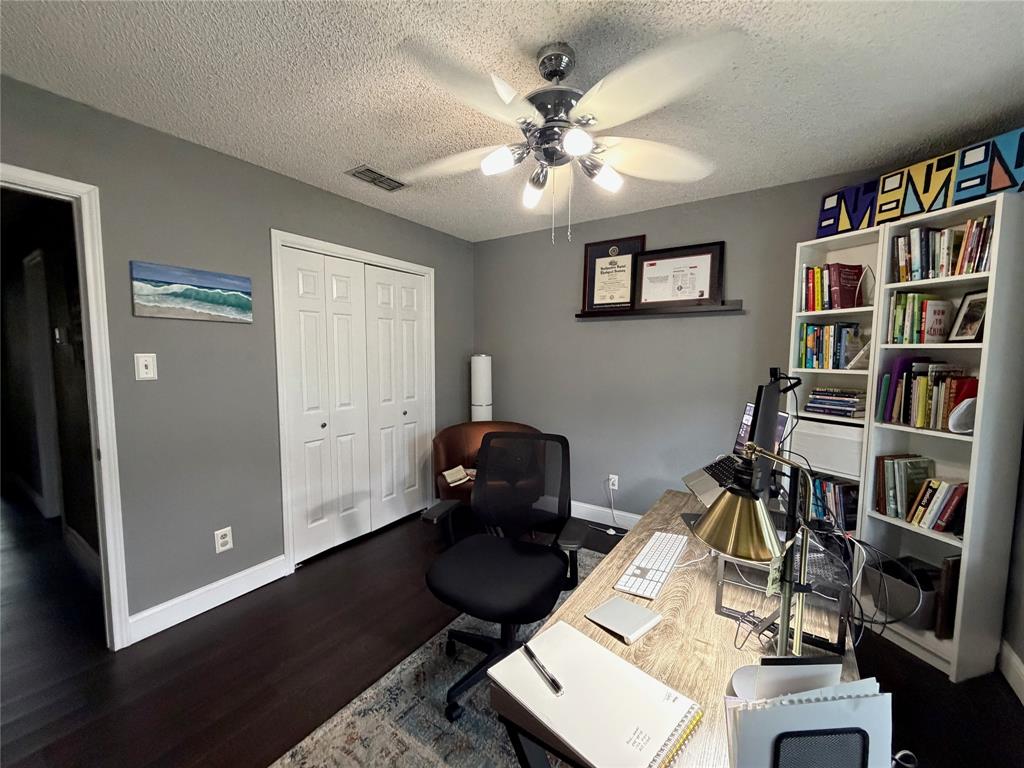 925 Manciples Way Abilene, TX 79602 - Photo 20 of 30 a room with a bookshelf and a window