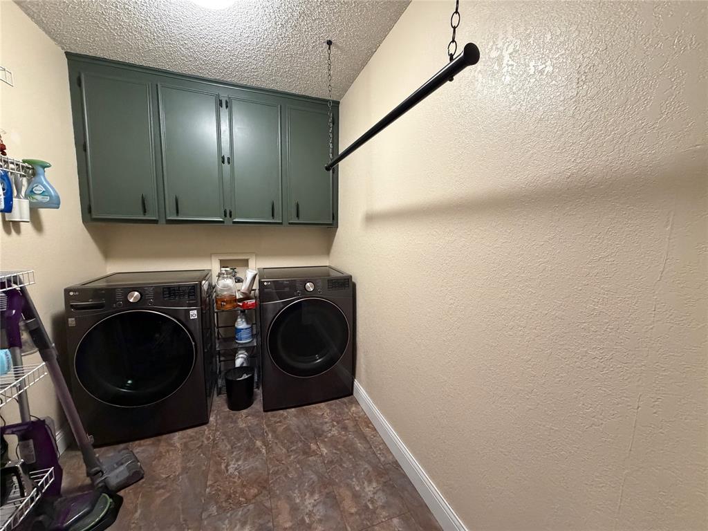 925 Manciples Way Abilene, TX 79602 - Photo 21 of 30 a utility room with dryer and washer
