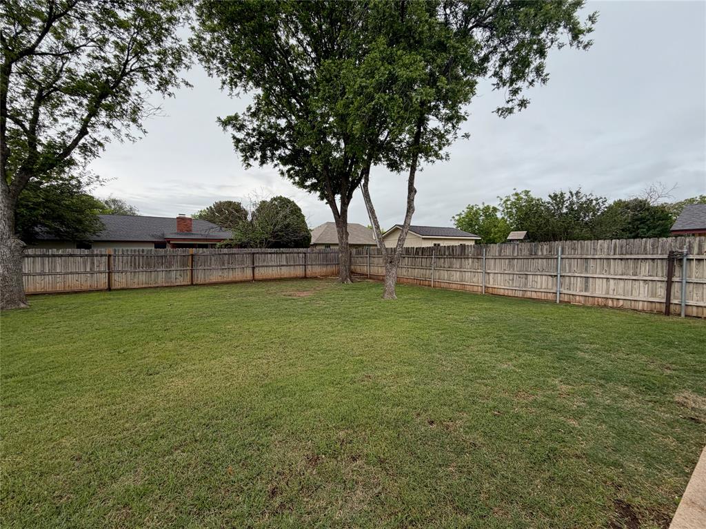 925 Manciples Way Abilene, TX 79602 - Photo 27 of 30 a view of outdoor space with deck and yard