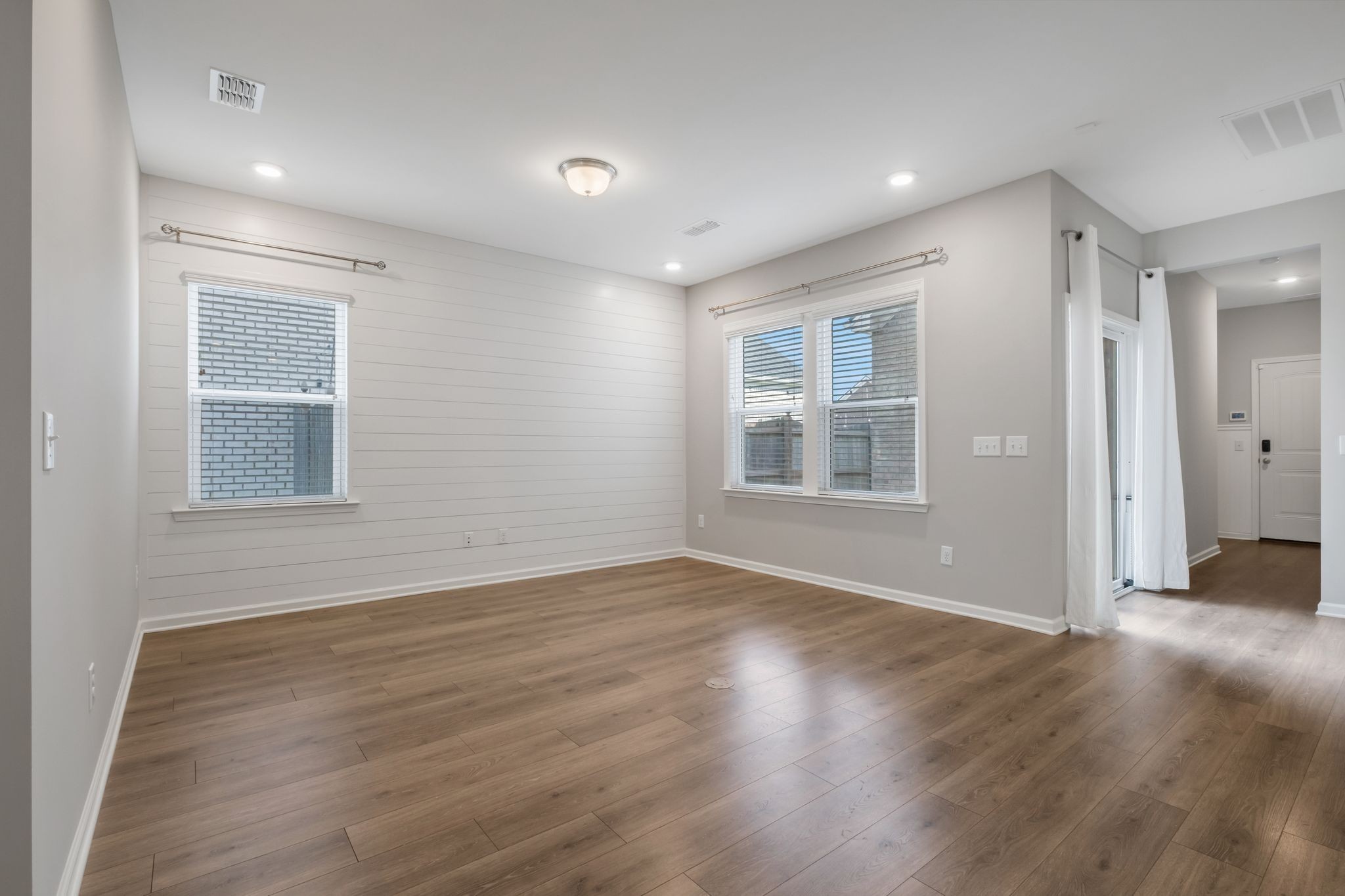 3721 Hoggett Ford Road Hermitage, TN 37076 - Photo 11 of 33 a view of empty room with wooden floor and fan