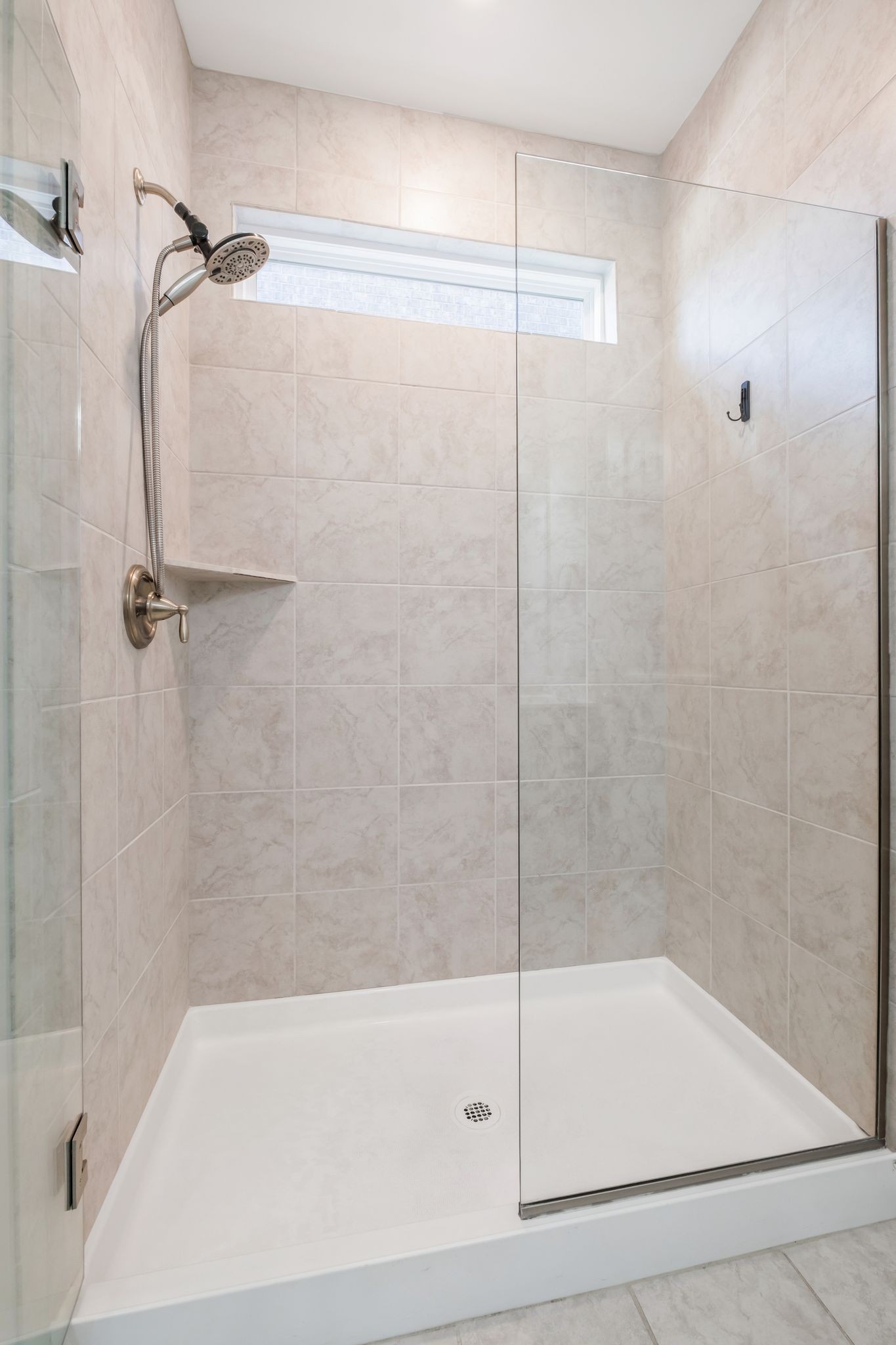 3721 Hoggett Ford Road Hermitage, TN 37076 - Photo 22 of 33 a bathroom with a shower and a bath tub