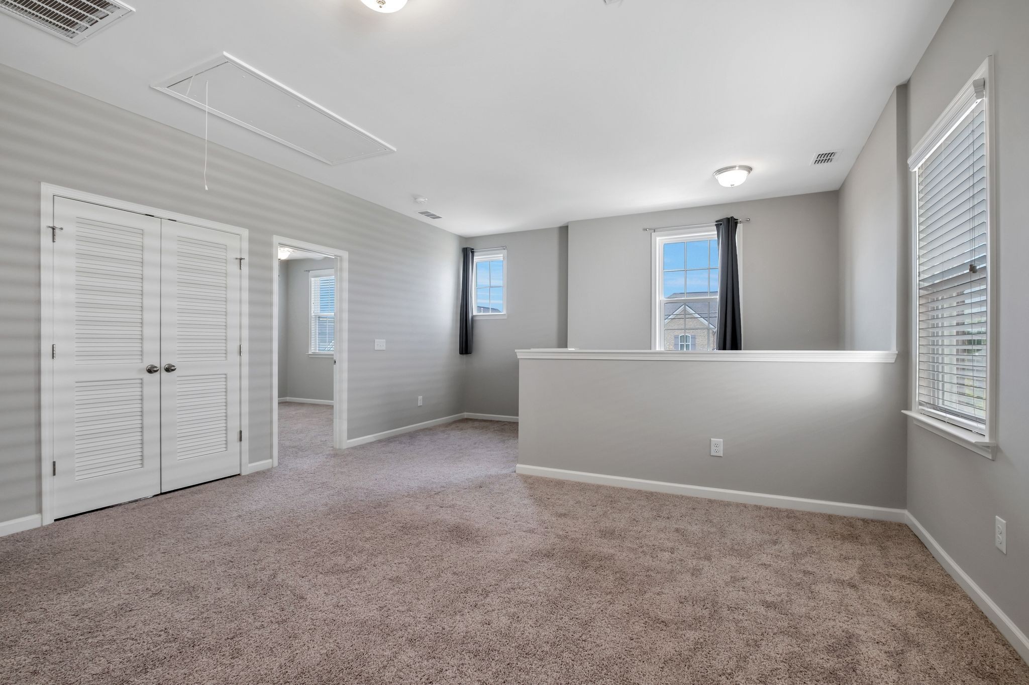 3721 Hoggett Ford Road Hermitage, TN 37076 - Photo 27 of 33 an empty room with windows and closet