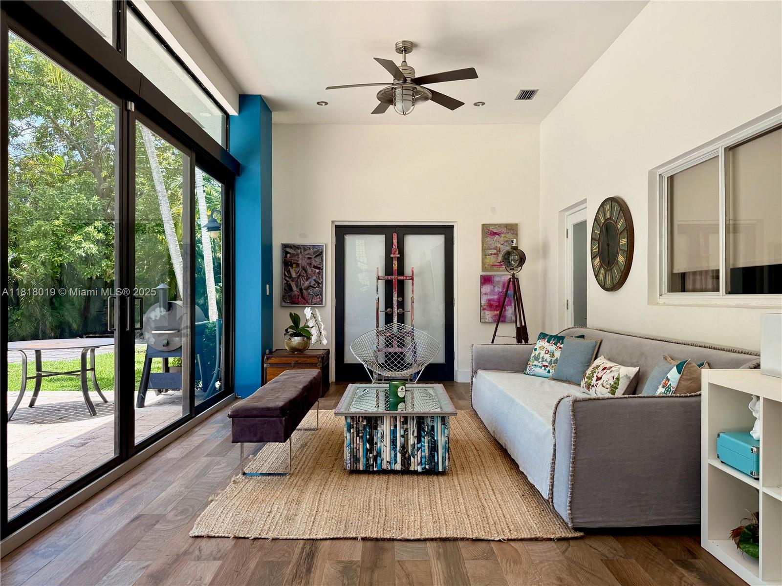 8200 Southwest 92nd Street Miami, FL 33156 - Photo 3 of 21 a living room with furniture and a large window