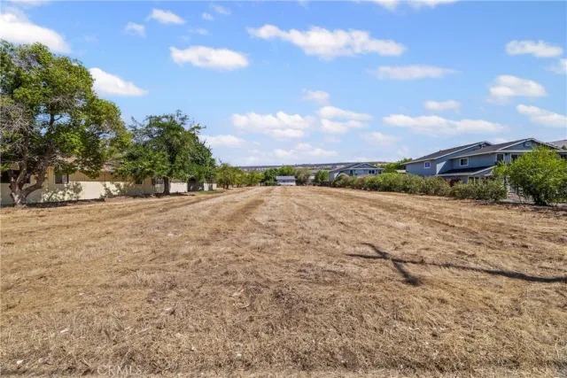 a view of a road with an ocean