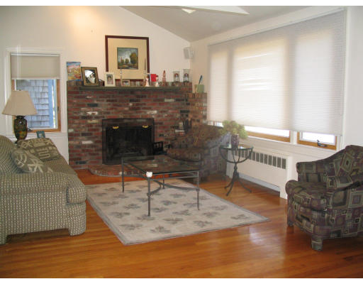 10 Rich Valley Road Wayland, MA 01778 - Photo 4 of 8 a living room with furniture and a fireplace