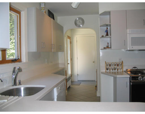 10 Rich Valley Road Wayland, MA 01778 - Photo 6 of 8 a kitchen with a sink and refrigerator