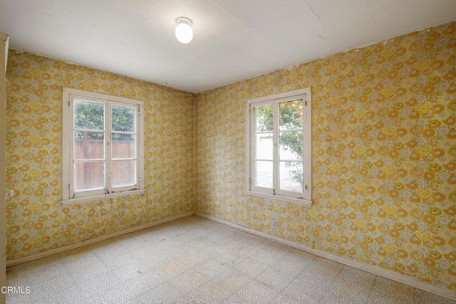 an empty room with a window