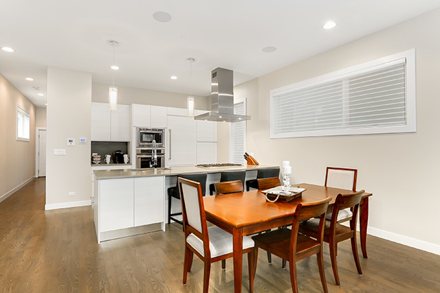 2042 West Rice Street, Unit 1 Chicago, IL 60622 - Photo 12 of 27 a view of a dining room with furniture and wooden floor