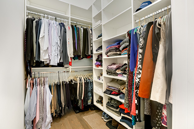 2042 West Rice Street, Unit 1 Chicago, IL 60622 - Photo 17 of 27 a view of walk in closet with clothes and shoes