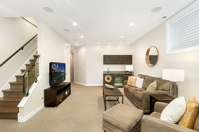 2042 West Rice Street, Unit 1 Chicago, IL 60622 - Photo 19 of 27 a living room with furniture and a flat screen tv