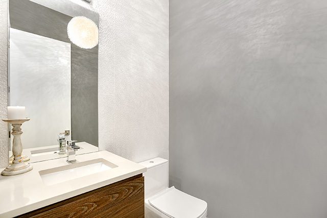 2042 West Rice Street, Unit 1 Chicago, IL 60622 - Photo 24 of 27 a bathroom with a sink vanity mirror and toilet