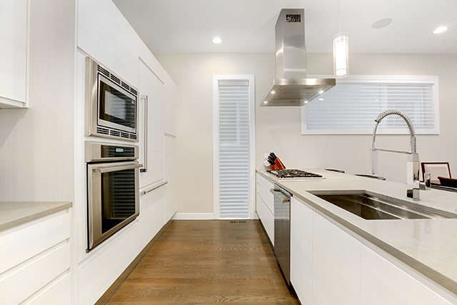 2042 West Rice Street, Unit 1 Chicago, IL 60622 - Photo 8 of 27 a kitchen with stainless steel appliances granite countertop a stove and a sink