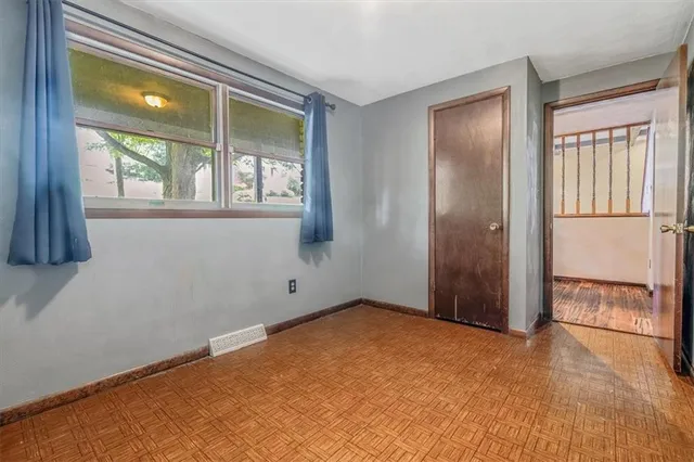 an empty room with a window