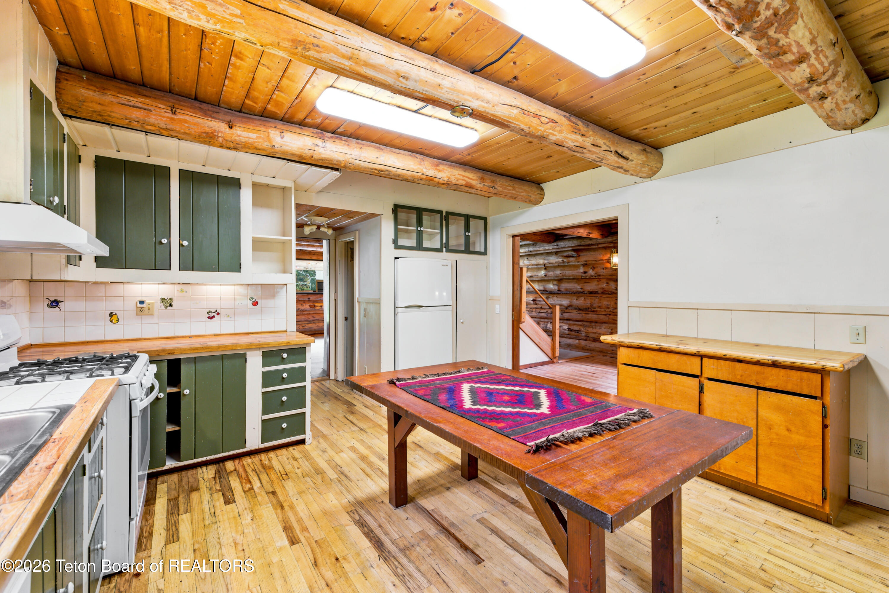 6475 Heck Of A Hill Road Wilson, WY 83014 - Photo 11 of 36 12 Main House Kitchen Table