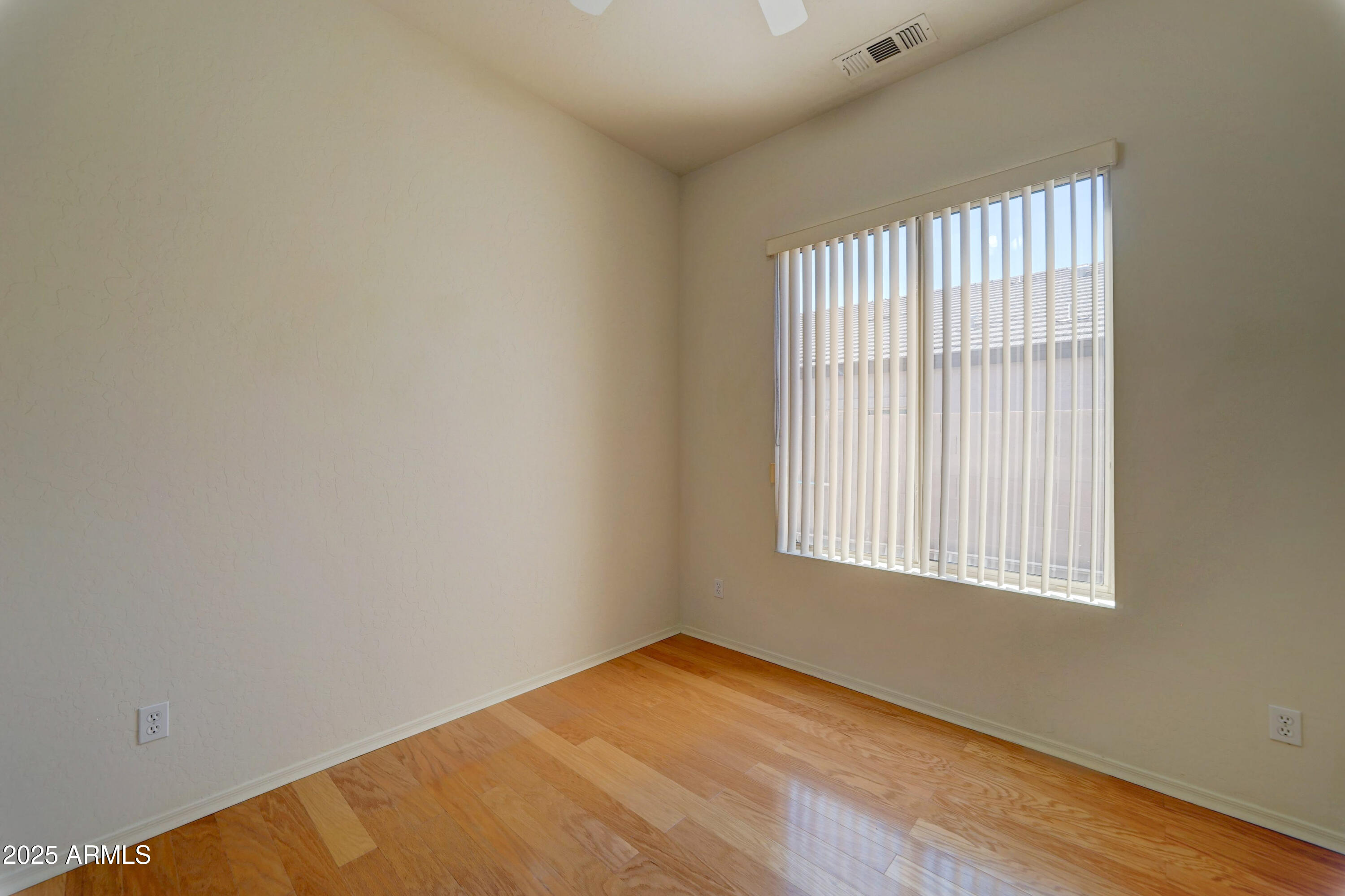 3055 North Red Mountain, Unit 74 Mesa, AZ 85207 - Photo 26 of 38 an empty room with a window
