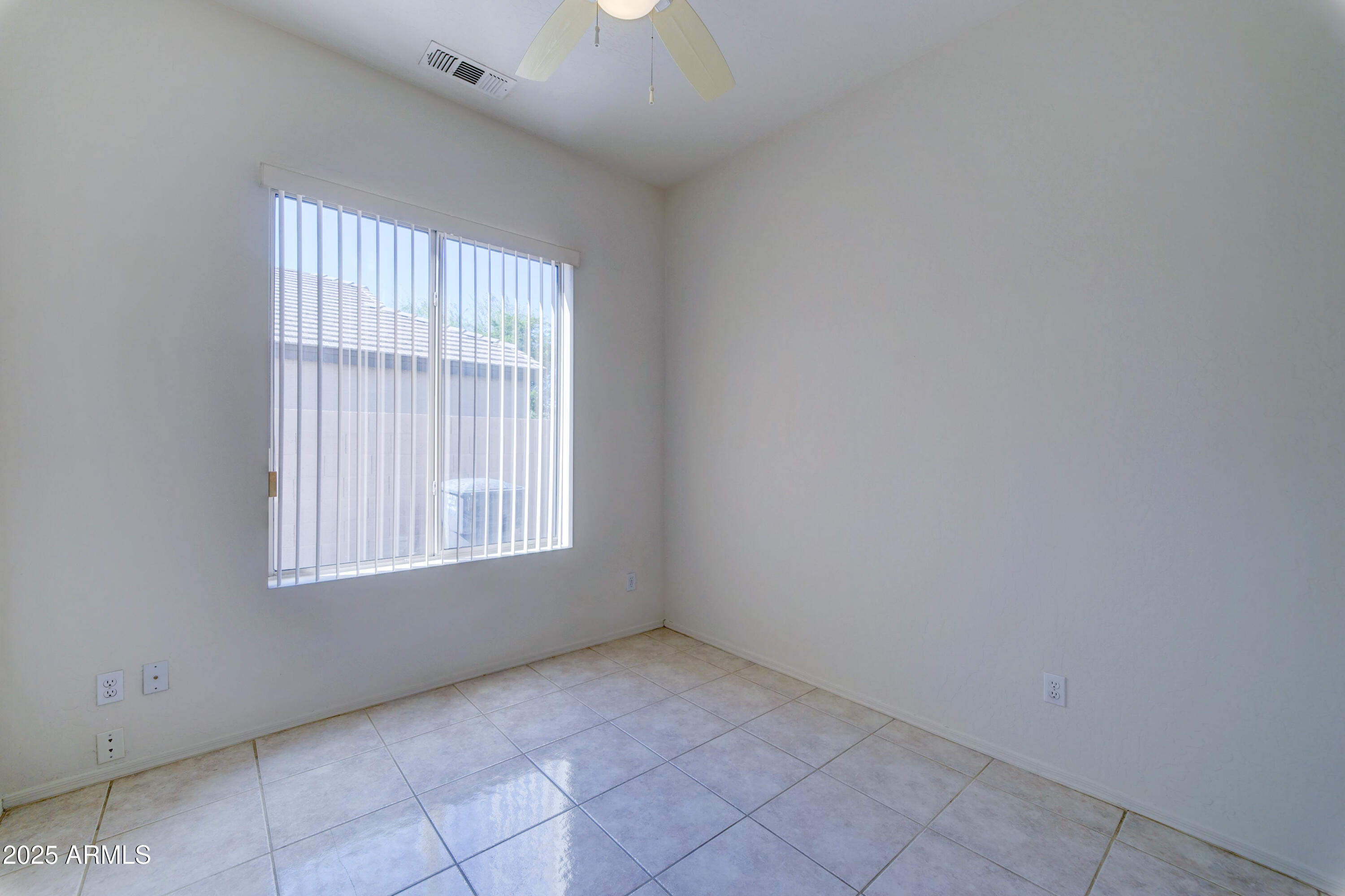 3055 North Red Mountain, Unit 74 Mesa, AZ 85207 - Photo 28 of 38 an empty room with windows