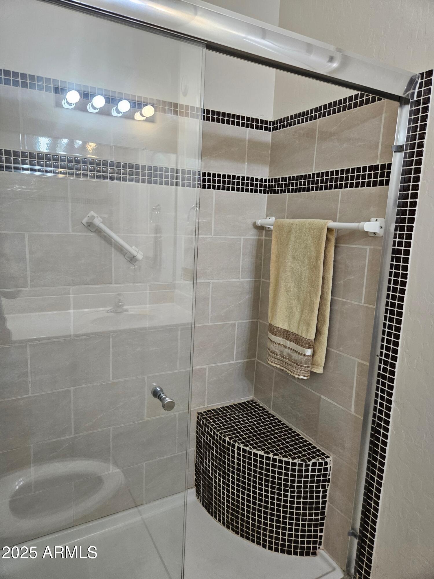 3055 North Red Mountain, Unit 74 Mesa, AZ 85207 - Photo 31 of 38 a bathroom with a shower