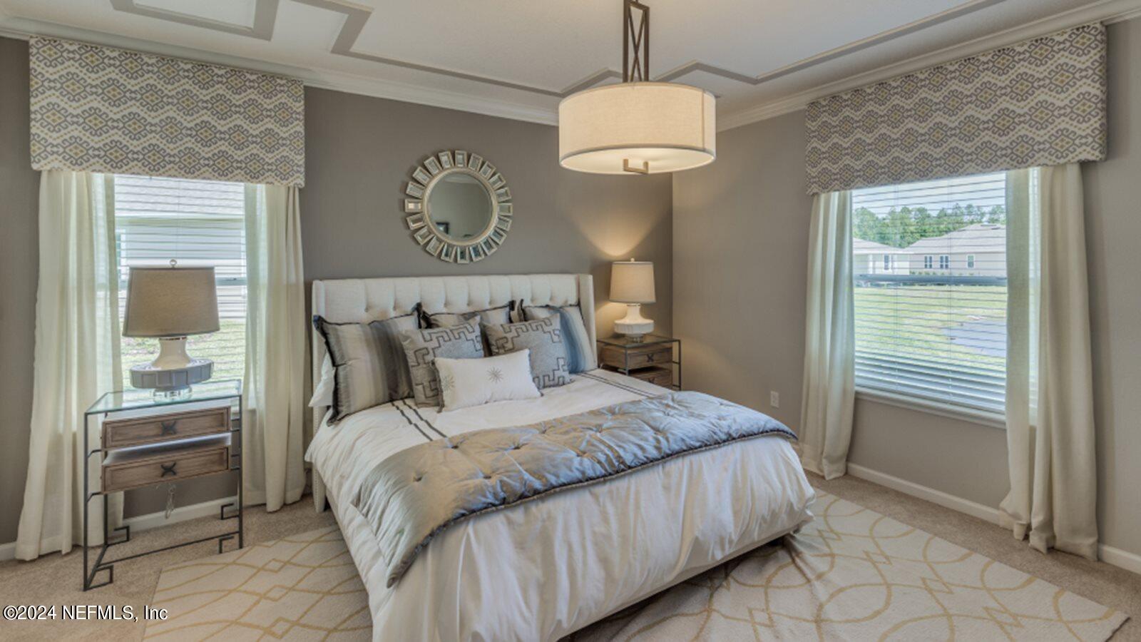 49 Blue Cypress Trail St. Augustine, FL 32084 - Photo 15 of 23 a bedroom with a bed and a table