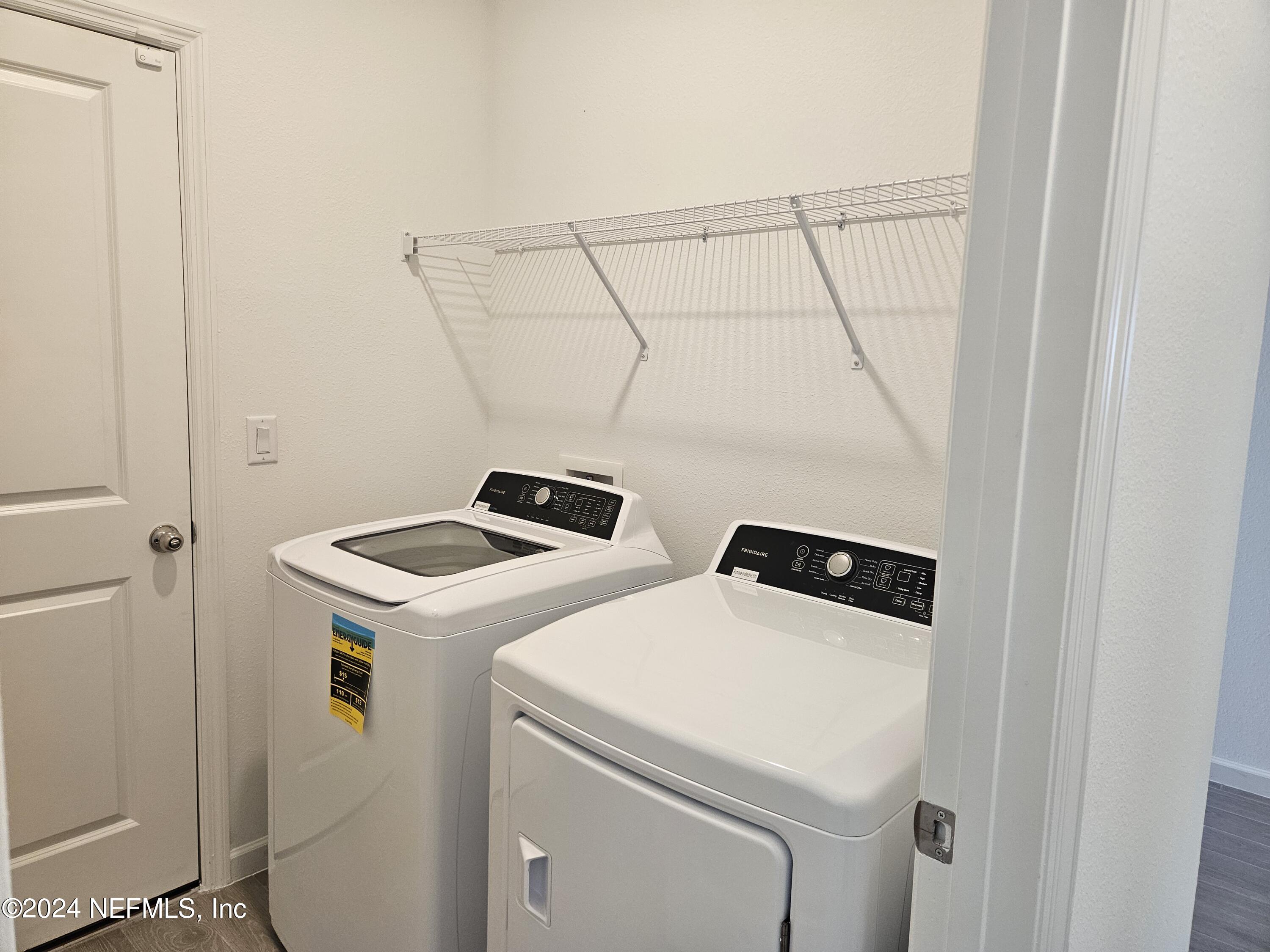 49 Blue Cypress Trail St. Augustine, FL 32084 - Photo 20 of 23 a utility room with dryer and washer