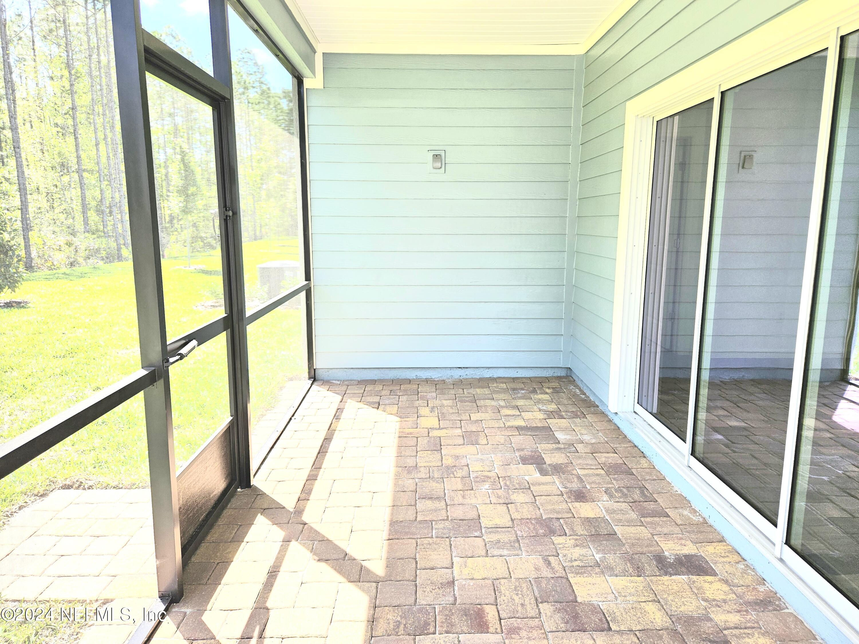 49 Blue Cypress Trail St. Augustine, FL 32084 - Photo 21 of 23 a view of a glass door