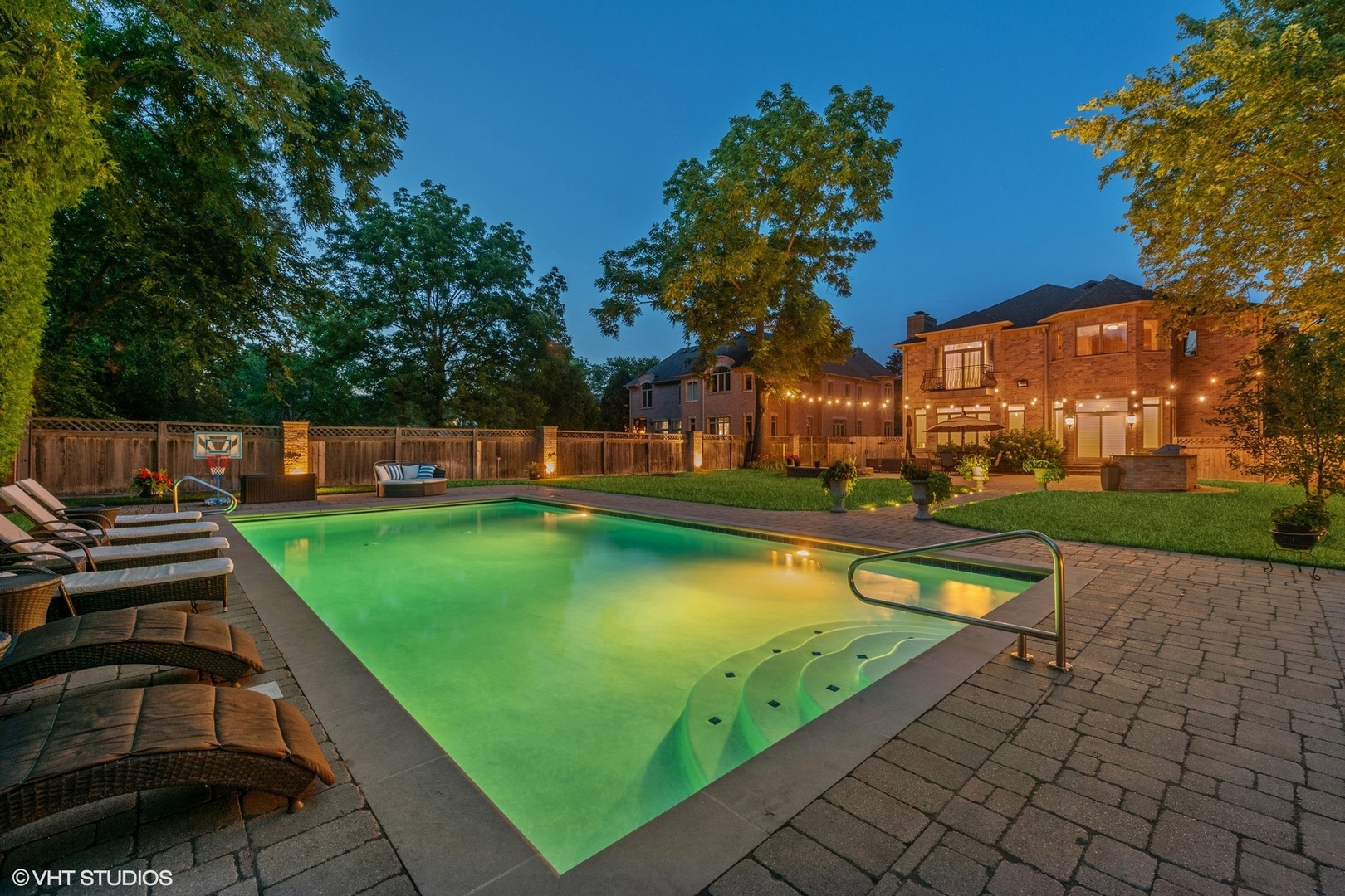 700 Greenwood Road Northbrook, IL 60062 - Photo 75 of 81 a view of a swimming pool with a patio and a yard