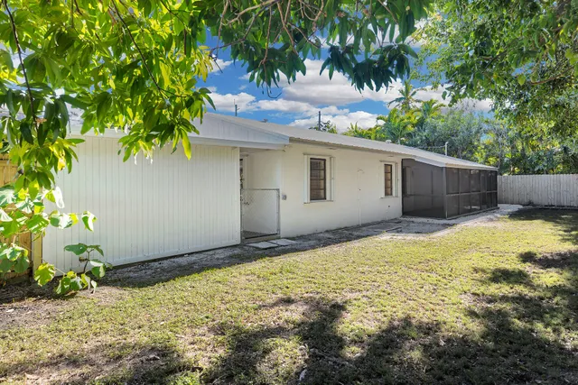 a front view of a house with a garage