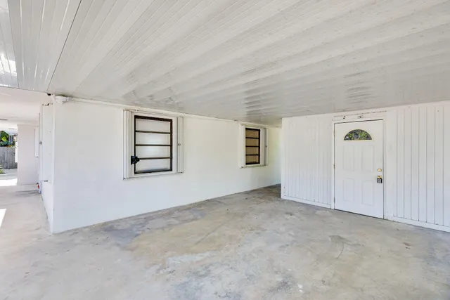 a view of car parked on the side of the road