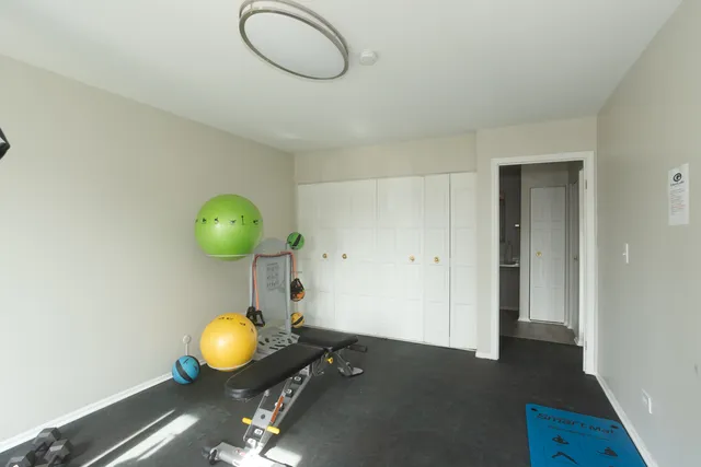 a view of a livingroom and wooden floor