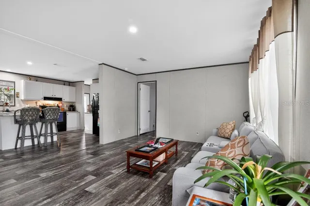 a view of street with wooden fence