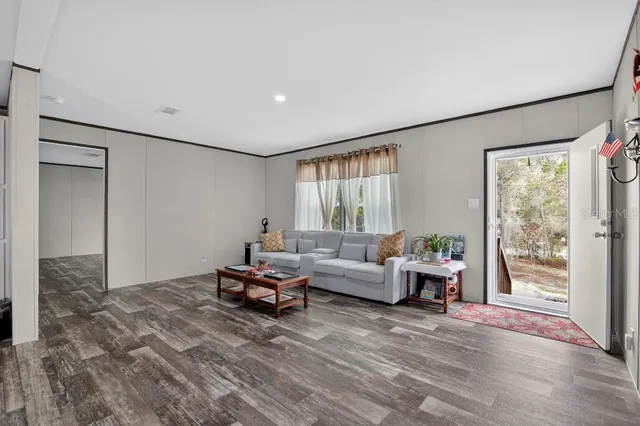 a view of outdoor space with garden and deck