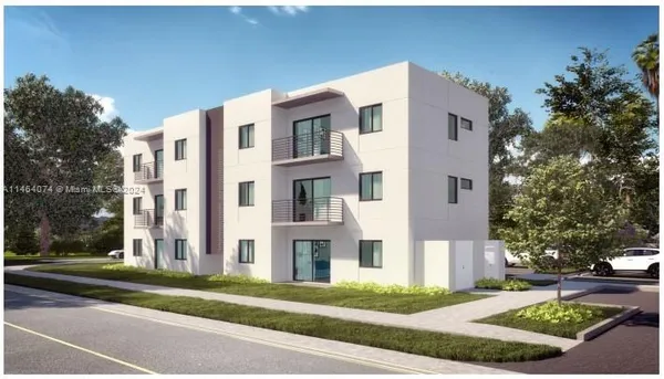 a front view of a building with garden