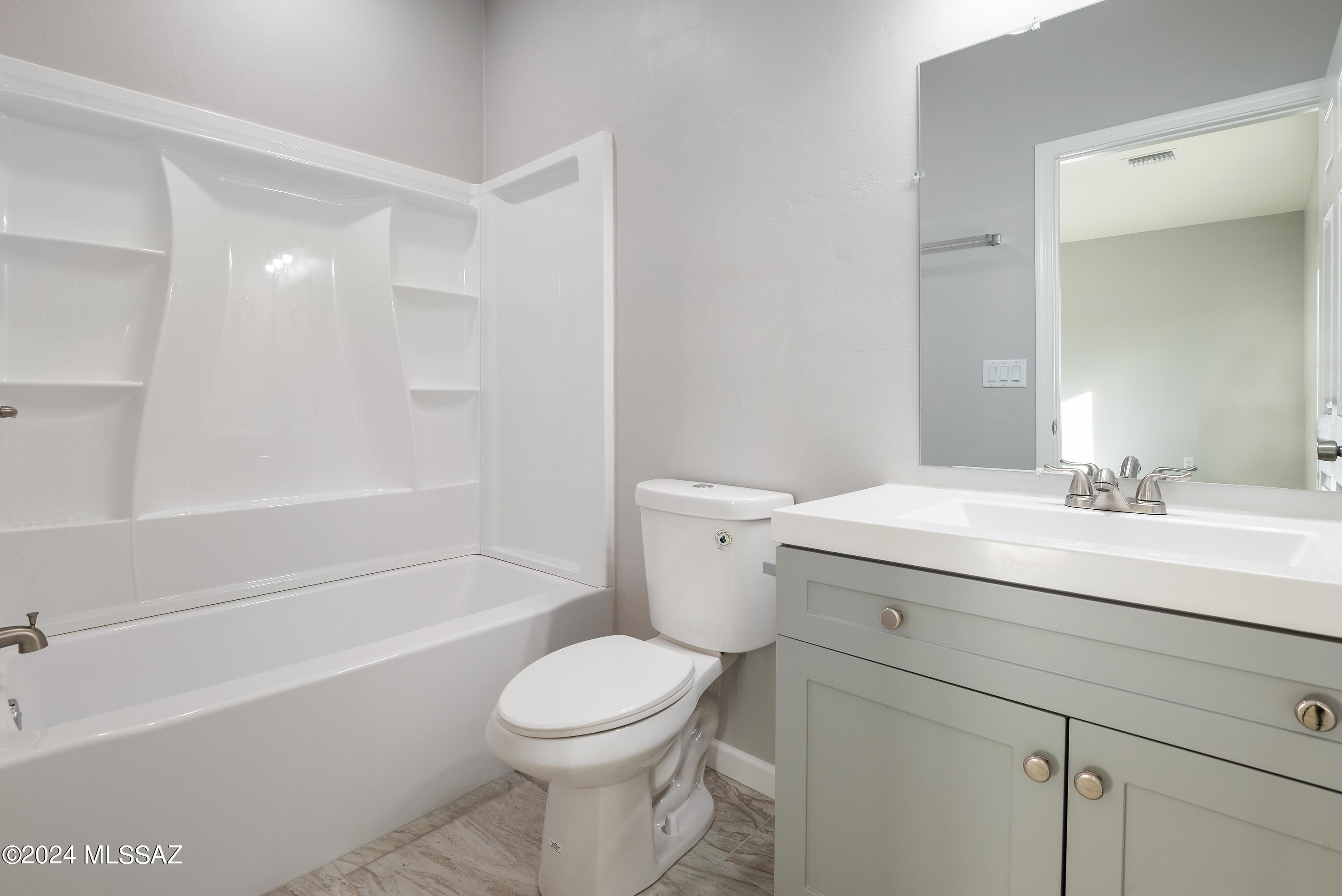 162 Camino Embarcadero Rio Rico, AZ 85648 - Photo 29 of 35 a bathroom with a sink a toilet and a bathtub