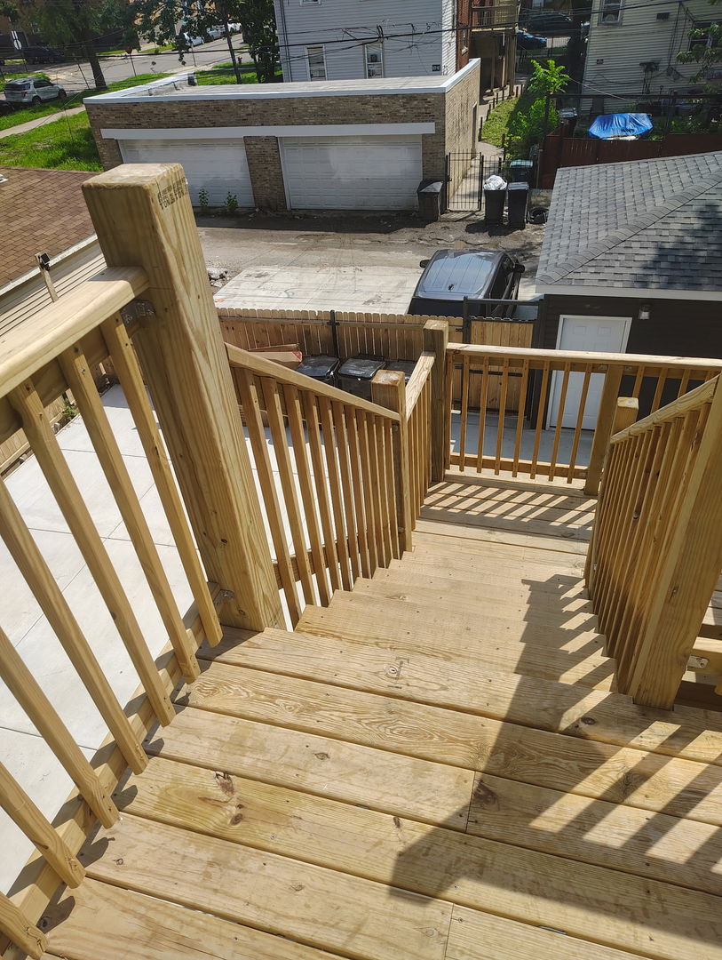 1051 North Springfield Avenue Chicago, IL 60651 - Photo 14 of 50 a view of deck with patio