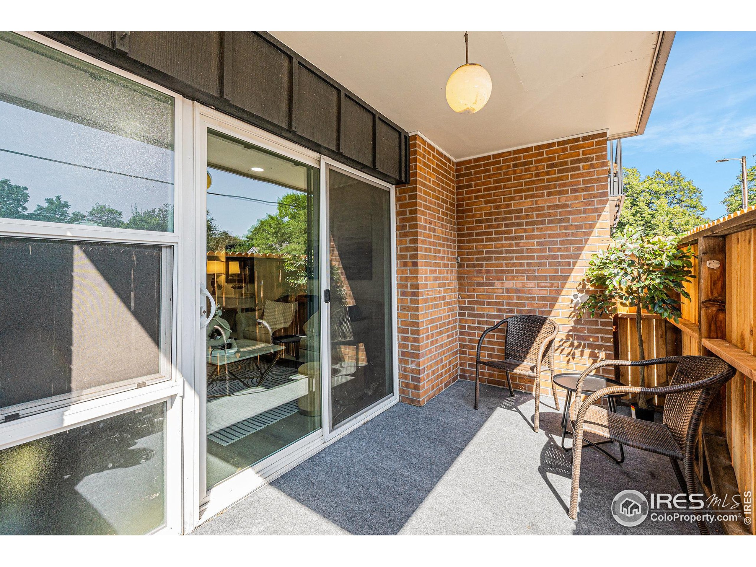 620 Mathews Street, Unit 104 Fort Collins, CO 80524 - Photo 17 of 32 a view of living room kitchen and entryway