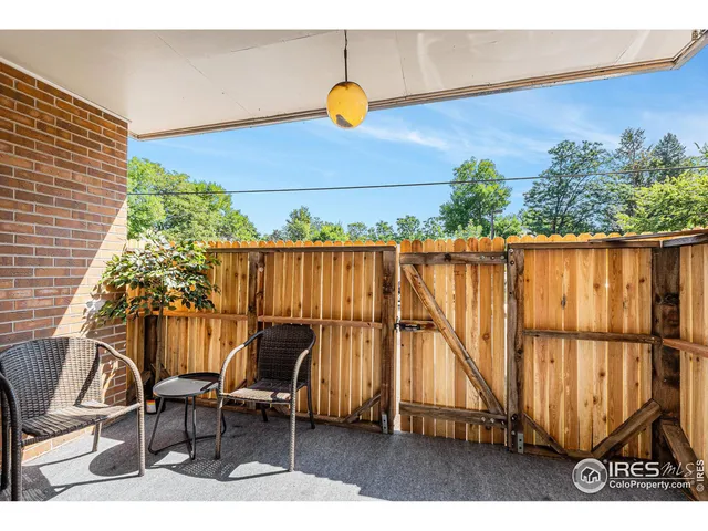 a view of sitting area in front of house