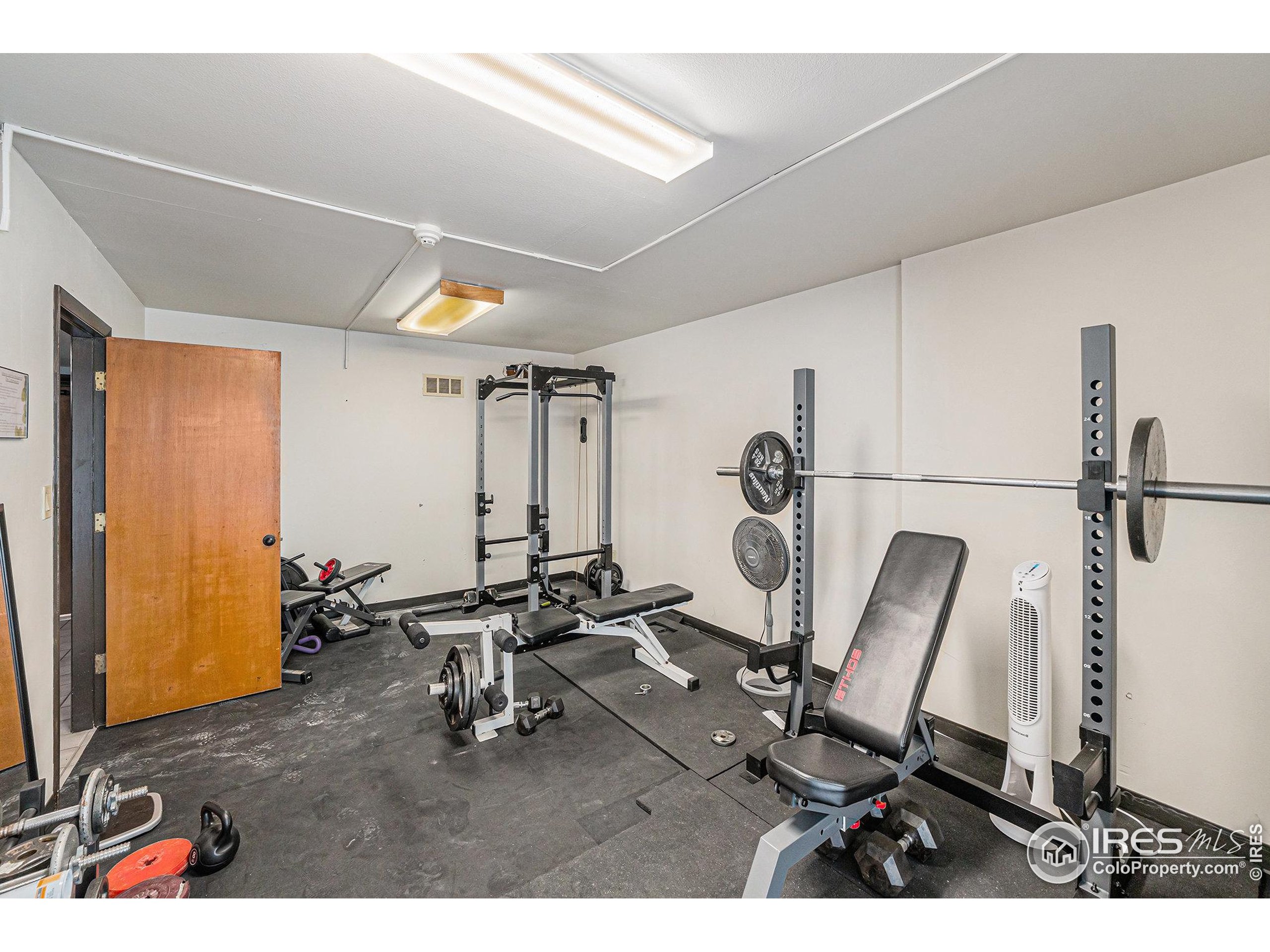 620 Mathews Street, Unit 104 Fort Collins, CO 80524 - Photo 24 of 32 a view of a room with gym equipment