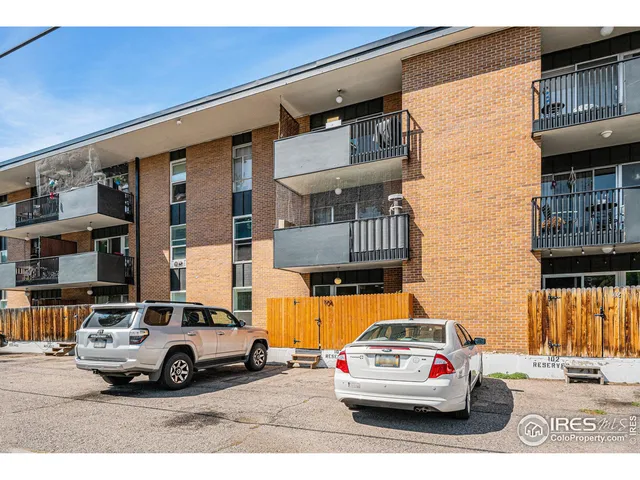 a car parked in front of a building